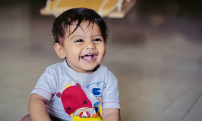 Niño riendo